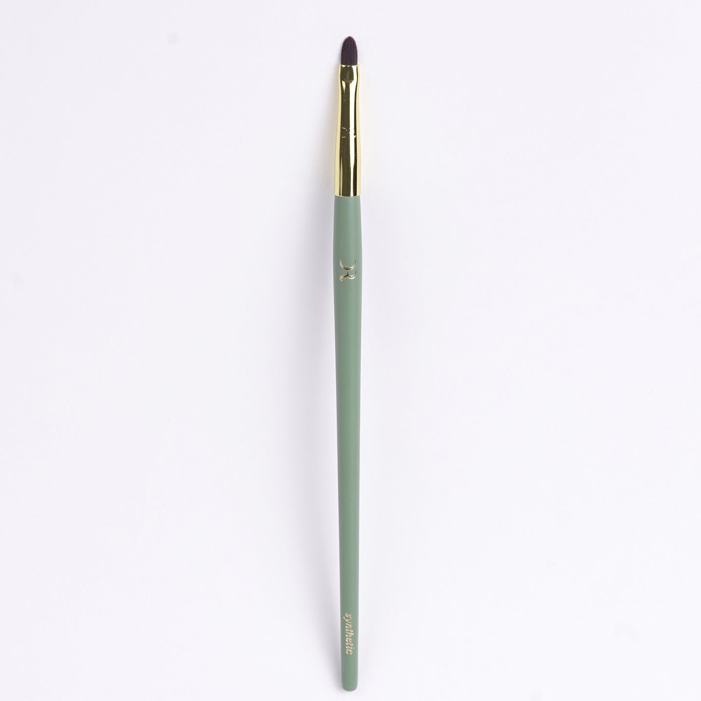 Tapered lipstick brush with sleek handle and firm bristles for controlled lip detailing.